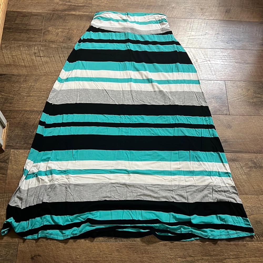 A soft, blue, black, grey and white striped maxi skirt